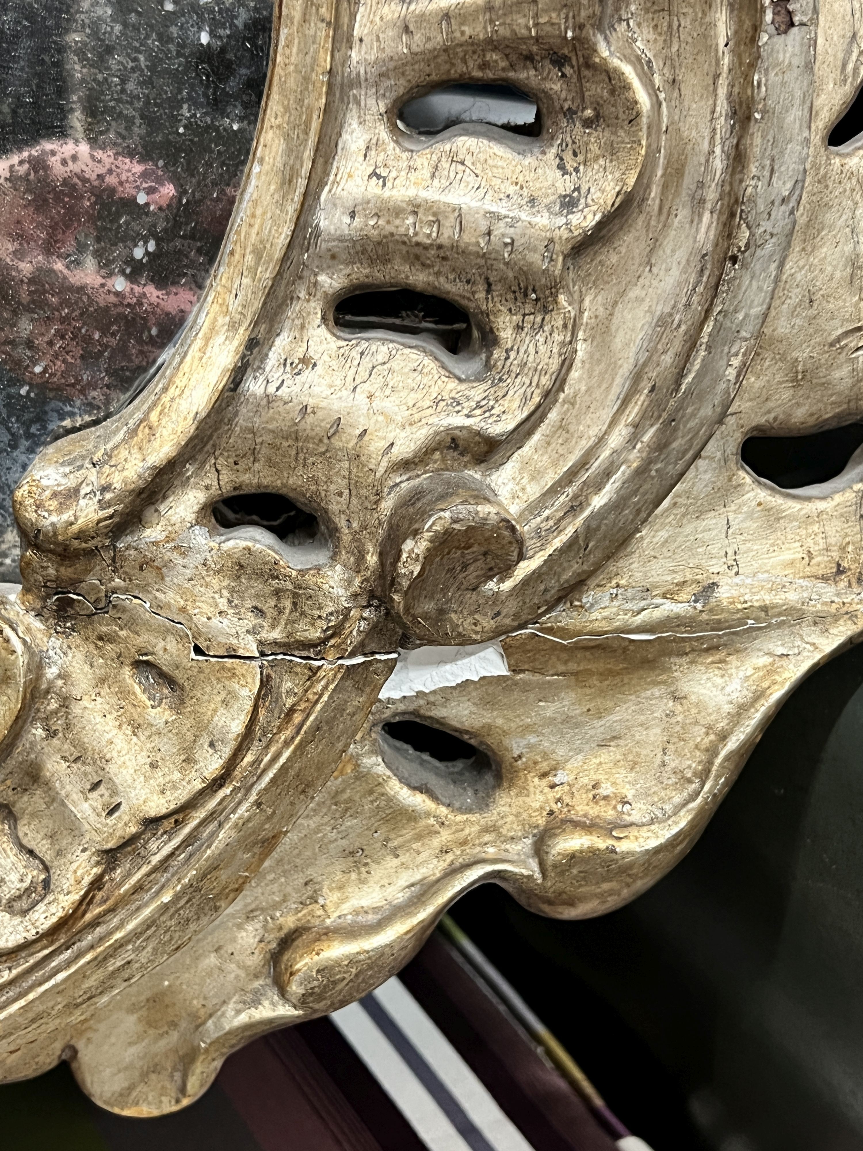 A 19th century Italian carved giltwood and gesso wall mirror, width 62cm, height 108cm